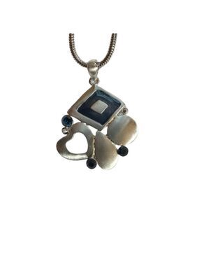 Abstract silver plated necklace.